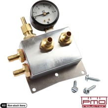 Fuel pressure regulator with barbed fittings