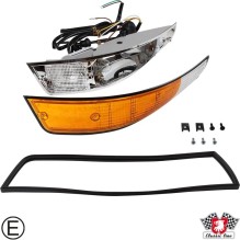 Indicator with black rim, front, complete with metal housing, with E-mark, left