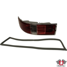 Tail light, US version, with housing and rubber seal, red/clear/red, left. Without E-mark
