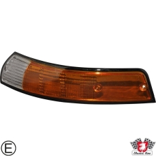 Lens for indicator with black rim, front, EU version, orange/clear, left, with E-mark